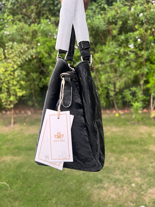 Elegant Black Handbag with Metal Top Handle & Shoulder Strap