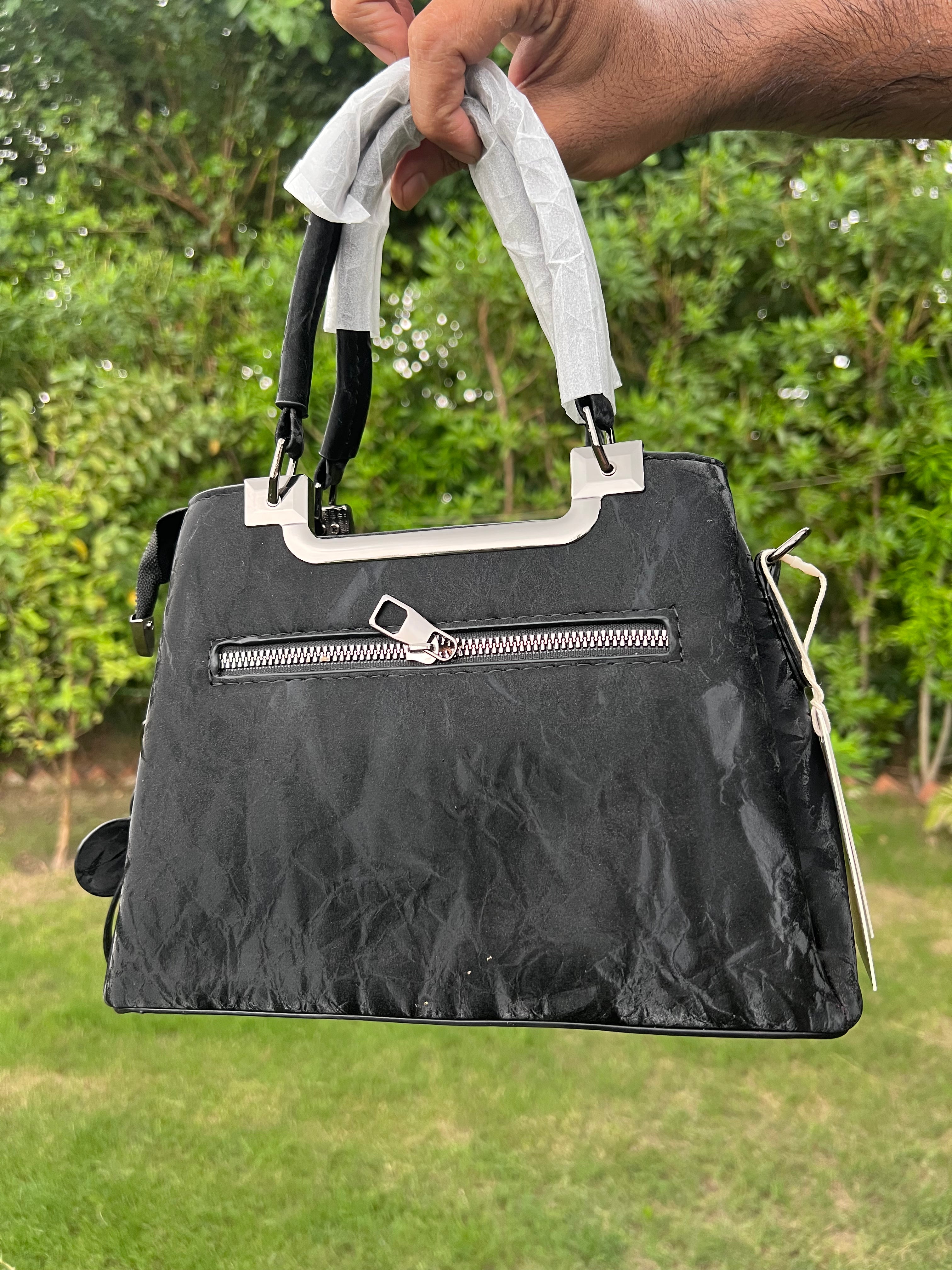 Elegant Black Handbag with Metal Top Handle & Shoulder Strap
