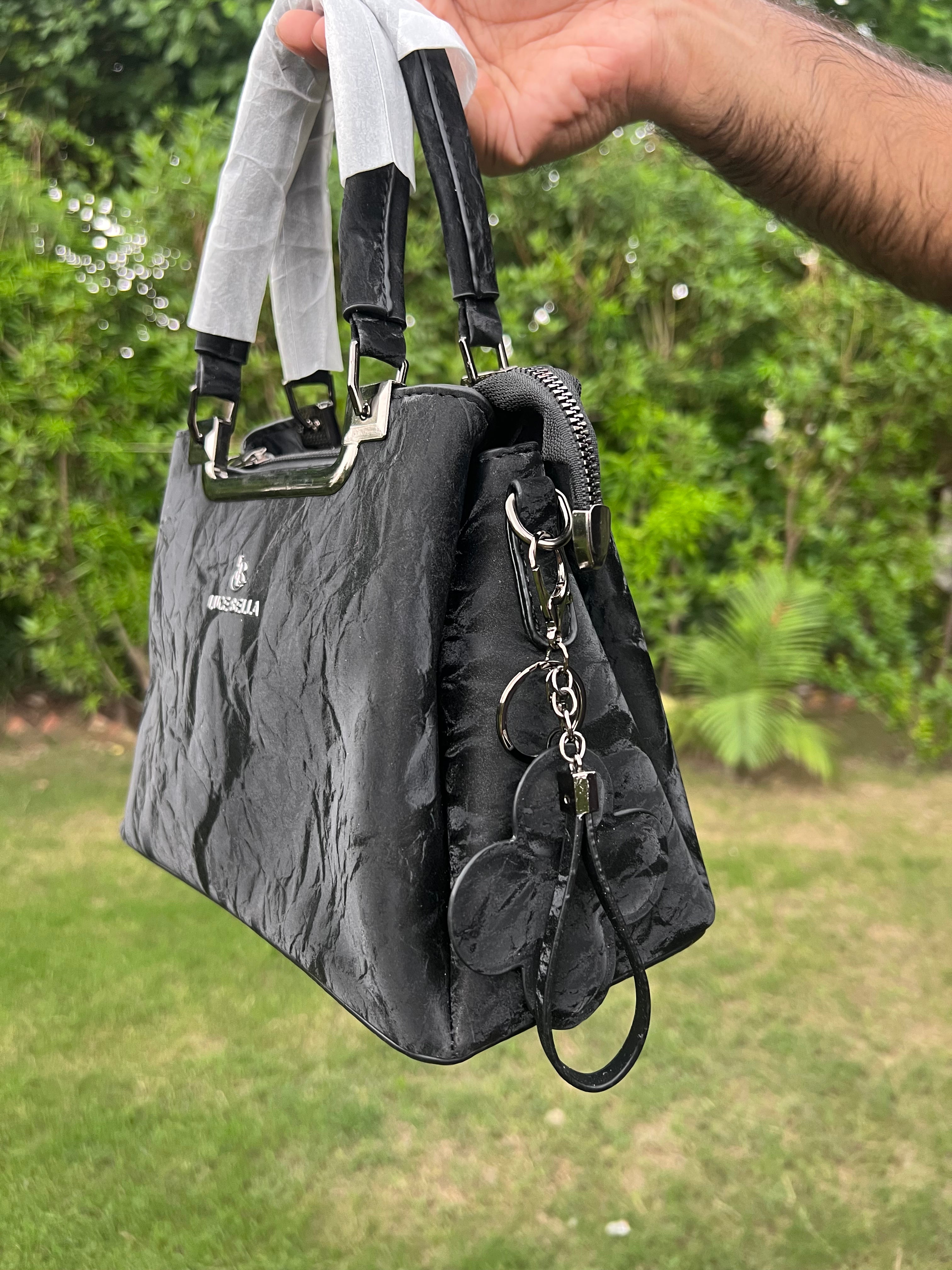 Elegant Black Handbag with Metal Top Handle & Shoulder Strap